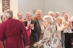 Mrs. Ann Holland, first female delegate recognized